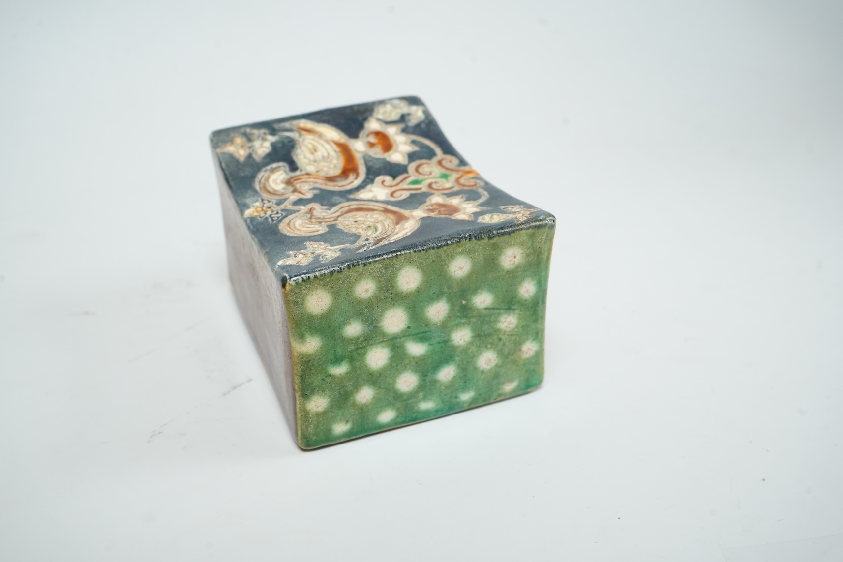 A Chinese stone ware arm rest, 10cm wide